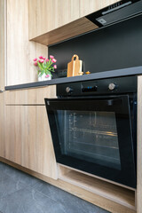 Modern electric oven in a stylish kitchen setting with elegant design elements