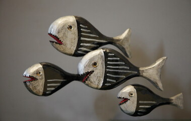 school of predatory fish piranha, close-up, puppets
