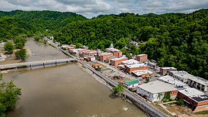 aerial view of the river with historic city of marshall north carolina 