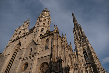 A striking upward view of St. Stephen’s Cathedral in Vienna, Austria, showcasing Gothic...