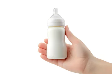 Hand holding a baby bottle isolated on white background