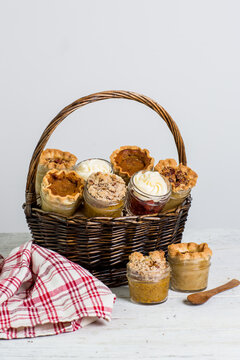 Assortment of cupcake and pies in mason jars 
