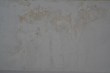 Grey Wall Texture with Subtle Beige Discoloration and Cracks
