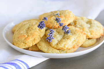 Plate with freshly baked cookies with lavender sprigs