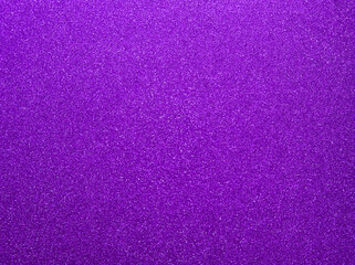 Purple sparkle background. Violet glitter background. Purple glimmer. Abstract twinkle texture. Glitter surface. Glimmer layout. Holiday layout. Diamond luxury surface. Celebration holiday background.