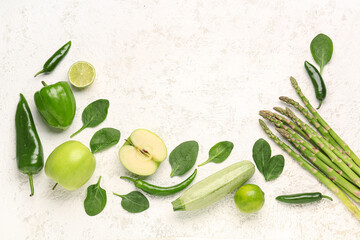 Composition with different fresh vegetables and fruits on white background