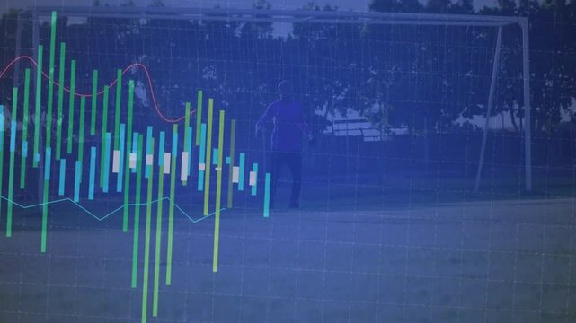 Teenage boy standing inside soccer goal while data bars sliding with lines tracing sports analytics