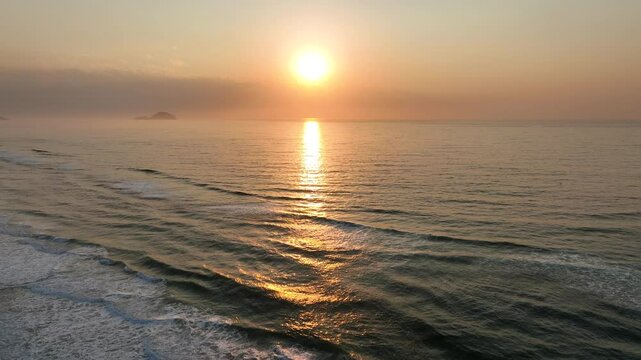 Florianopolis in Santa Catarina during a wonderful sunrise. Mo&ccedil;ambique Beach in aerial view.