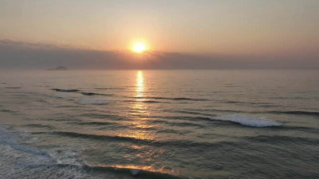 Florianopolis in Santa Catarina during a wonderful sunrise. Mo&ccedil;ambique Beach in aerial view.