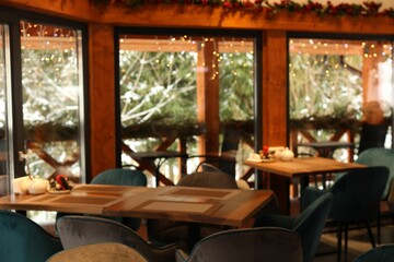 Modern cafe interior with new stylish furniture
