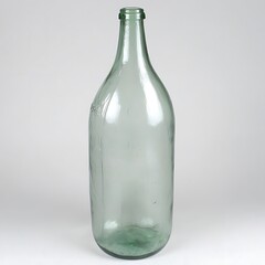 Fototapeta premium Classic oversized glass bottle, light green, showcasing vintage charm and simplistic design