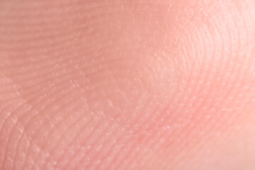 Fototapeta premium Macro view of human fingertip