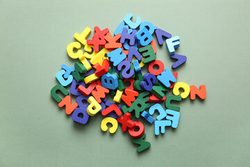 Colorful English letters on green background © Pixel-Shot