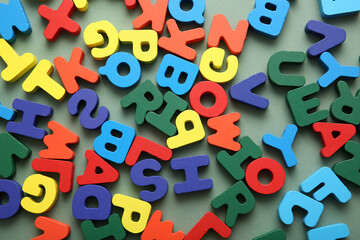 Colorful English letters on green background