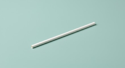 Close Up White Paper Drinking Straw on Blue Background Studio Shot