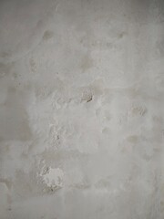 Textured peeling plaster wall surface