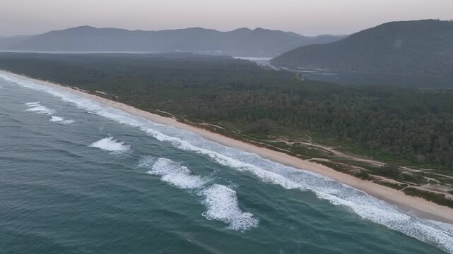 Florianopolis in Santa Catarina during a wonderful sunrise. Mo&ccedil;ambique Beach in aerial view.