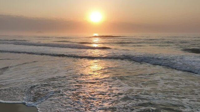 Florianopolis in Santa Catarina during a wonderful sunrise. Mo&ccedil;ambique Beach in aerial view.