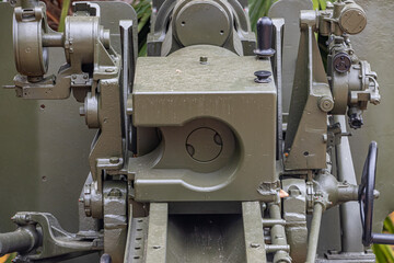 A close-up view of the 105mm M101 cannon with the breech