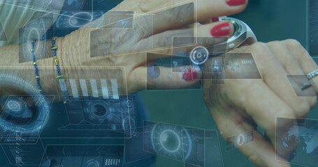 Senior woman's hands tapping silver smartwatch at tech demo, with holographic data panels