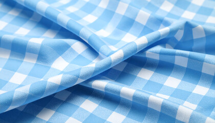 A close-up of a blue and white checkered fabric, showcasing its smooth texture and vibrant colors, ideal for various design and craft projects