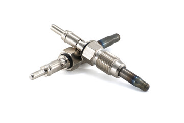 Two new, silver glow plugs, crucial for starting a diesel engine, are isolated on white.