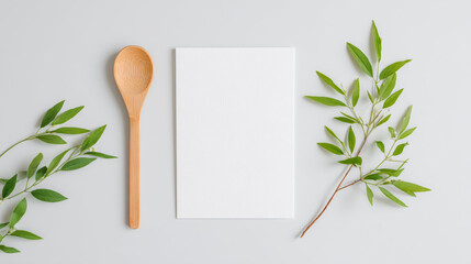 Some decorations are placed around the blank notebook

