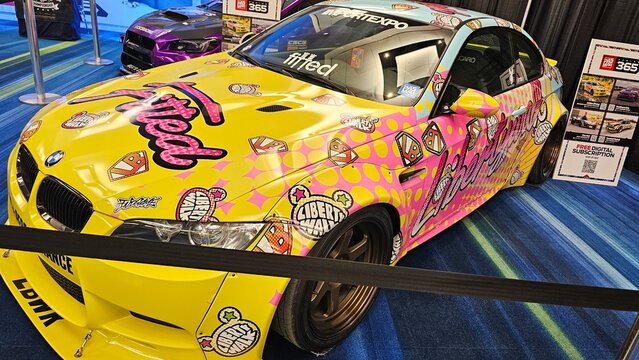 Toronto, ON Canada - 02.16.2025: Customized Auto with Vibrant Decals Displayed at Automotive Expo, Showcasing Unique Design, Style.
