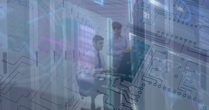Image of data processing over two caucasian business people