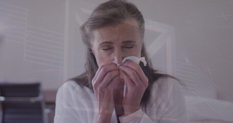 Image of data processing over senior caucasian woman sneezing