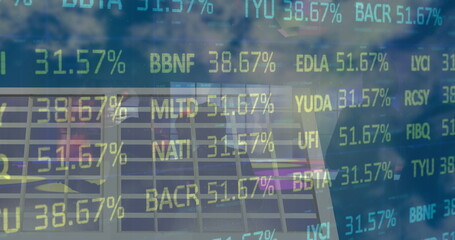 Image of financial data and graphs over solar panels