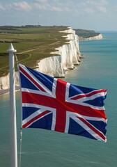 Waving UK Union Jack Flag Symbolizing Island Nation History Against the Iconic White Cliffs of Dover
