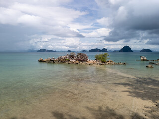 rocks over water with turquoise water in Krabi Thailand