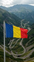 Waving Romanian Flag Symbolizing Latin Heritage Across the Dramatic Carpathian Mountain Landscape