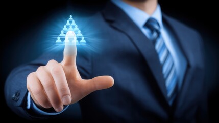 A man in a suit pointing to a lightbulb as a representation of an organizational structure designer and creative ideas