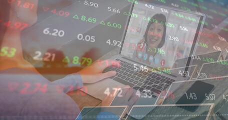 Image of financial data and caucasian woman having image call on laptop over solar panels