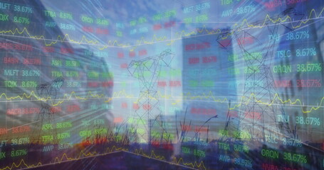 Image of financial data over screens and blurred cityscape