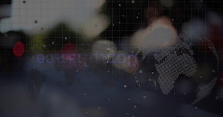 Image of globe and data processing over city traffic at night