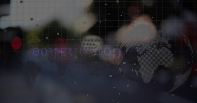 Image of globe and data processing over city traffic at night