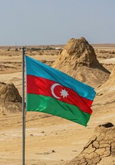 Waving Azerbaijani Flag Symbolizing Land of Fire Over the Unique Mud Volcano Landscape of Gobustan