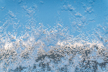 Aqua background. Product space next to clean water streams and water splashes and drops.