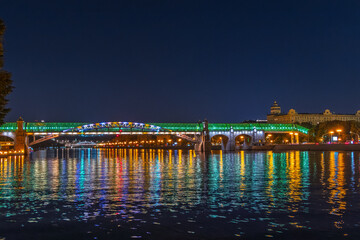 Fototapeta premium Pushkinskiy bridge with night illumination. Bridge to Gorky Park.