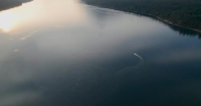 Drone Top View of Motorboat on Rural Mountain Lake