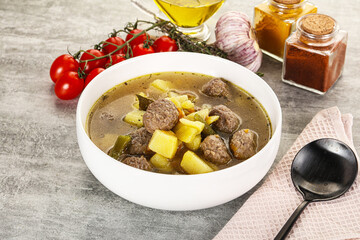 Soup with meatball and potato
