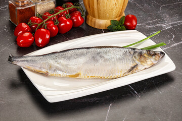 Whole raw salted herring fish
