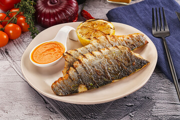 Grilled seabass fillet with lemon