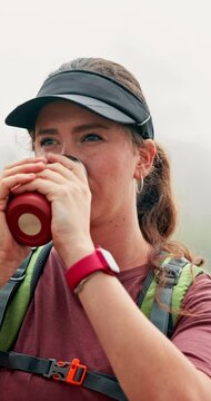 Flusk, hiking and woman in woods, coffee and nature with environment, caffeine and forest. Person, outdoor and hiker with herbal tea, trekking and countryside with wellness, healthy and wilderness