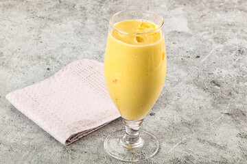 Cold sweet mango smoothie glass