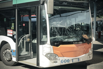 unbreakable frontal glass damaged by crash in a public transport bus