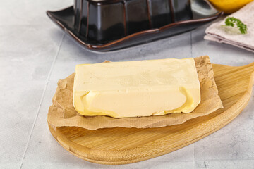 Dairy butter piece over board